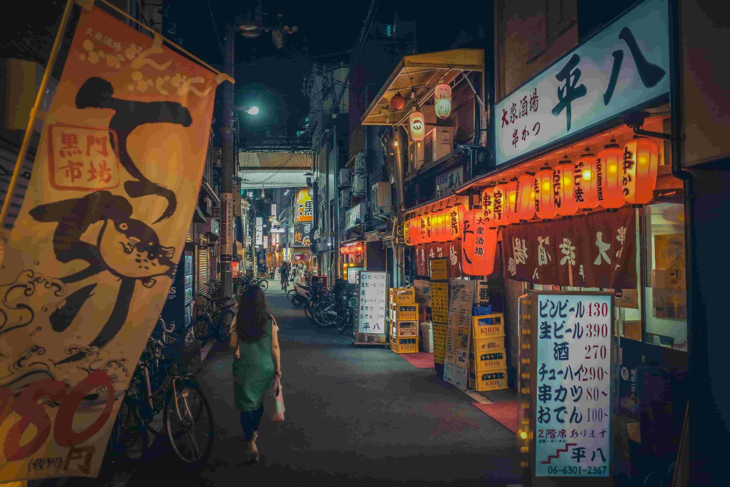 An image of an izakaya stall with its menu standing outside for locals and food goers to see.