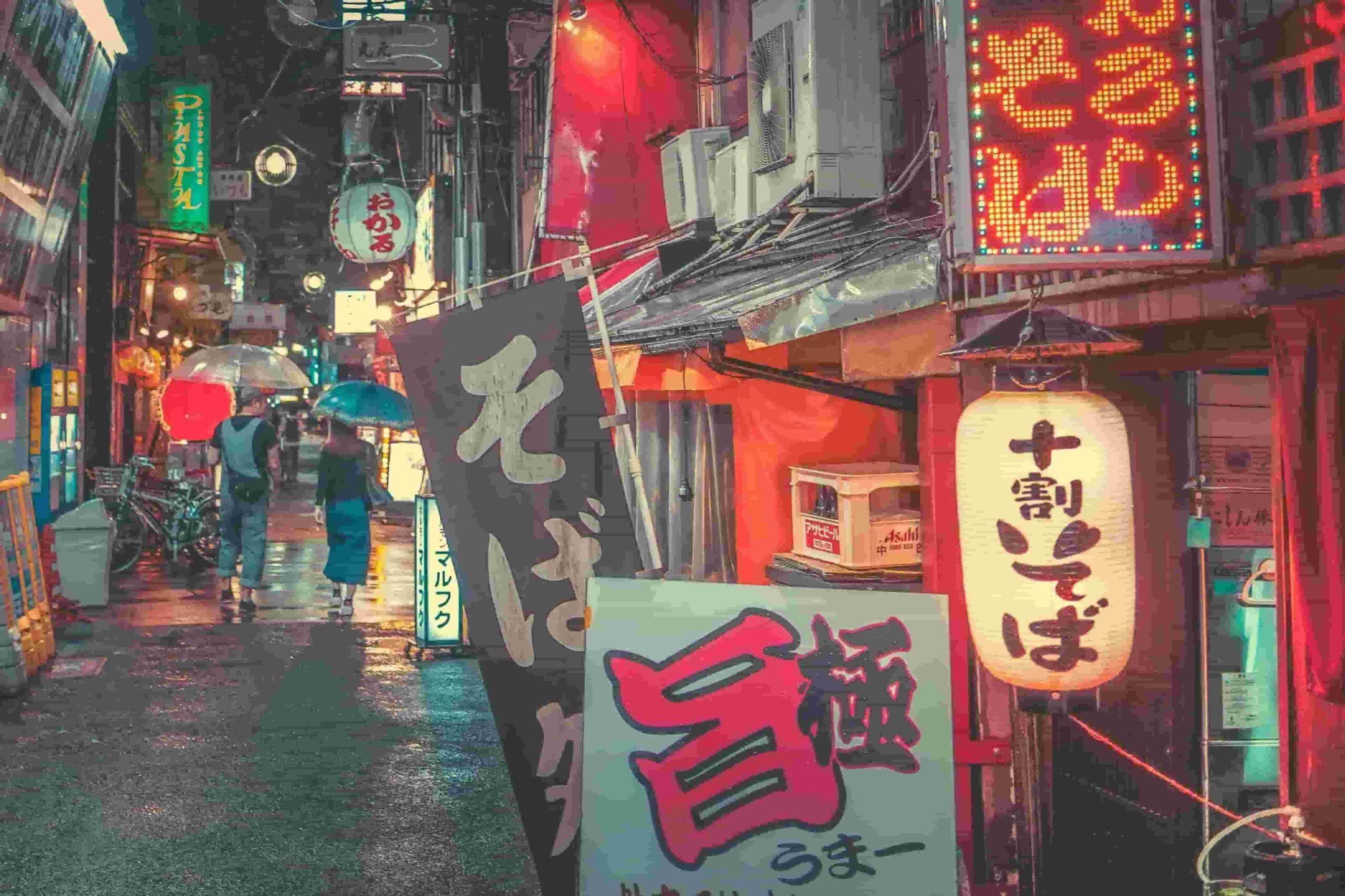 A photo of an izakaya stall with an abundant amount of signage to capture food goers' attention.
