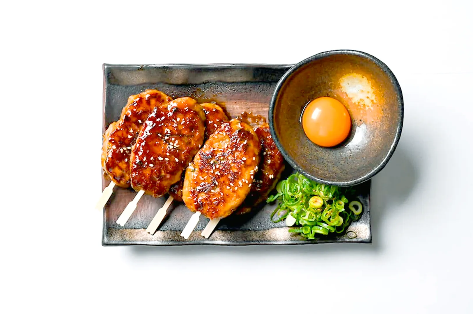 Char-grilled yakitori like tsukune is a highlight of the Zenryoku Izakaya menu.