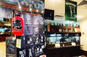 Toku Izakaya Bar entrance at Midpoint Orchard Singapore with traditional Japanese lantern and noren curtain