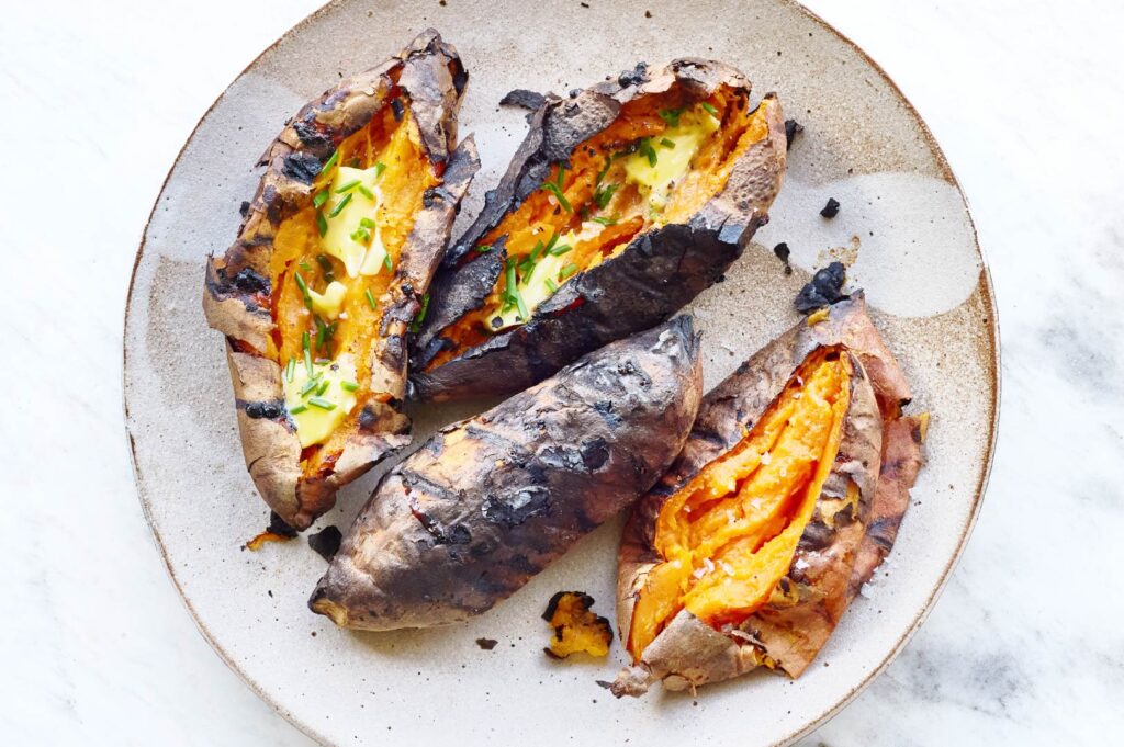 Charred Japanese sweet potato with butter on plate, smoky izakaya-style side dish in Singapore