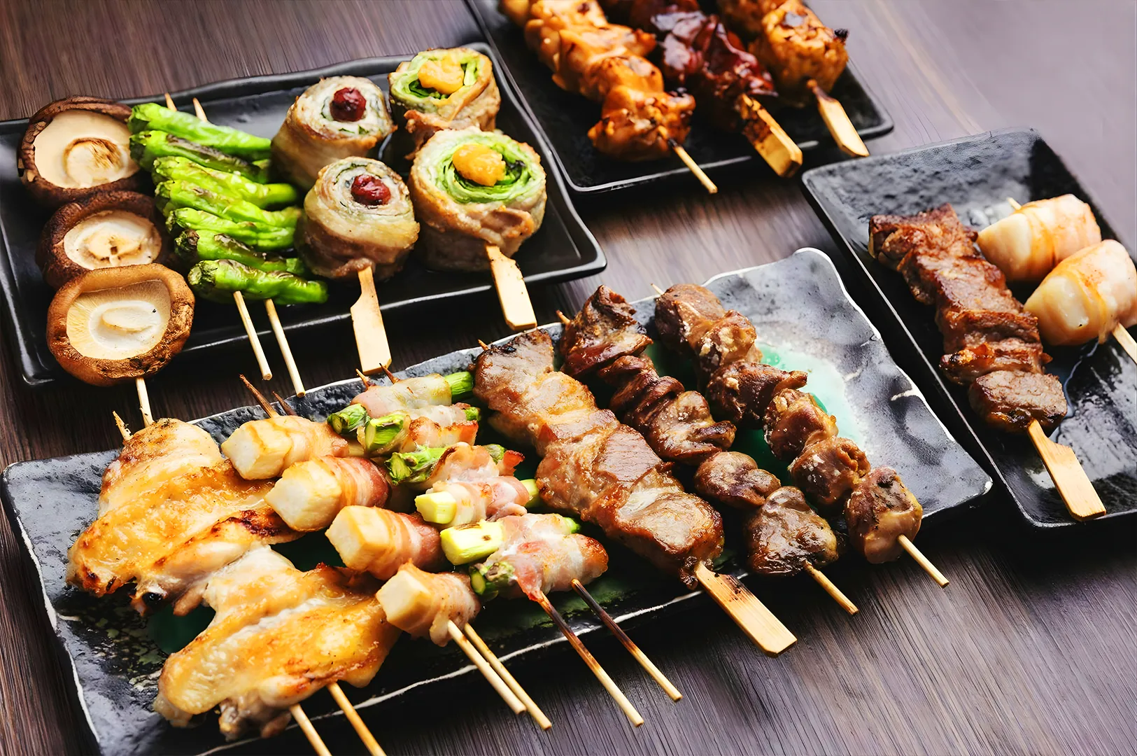 Japanese yakitori skewers assortment with grilled meats and vegetables at izakaya in Somerset Singapore