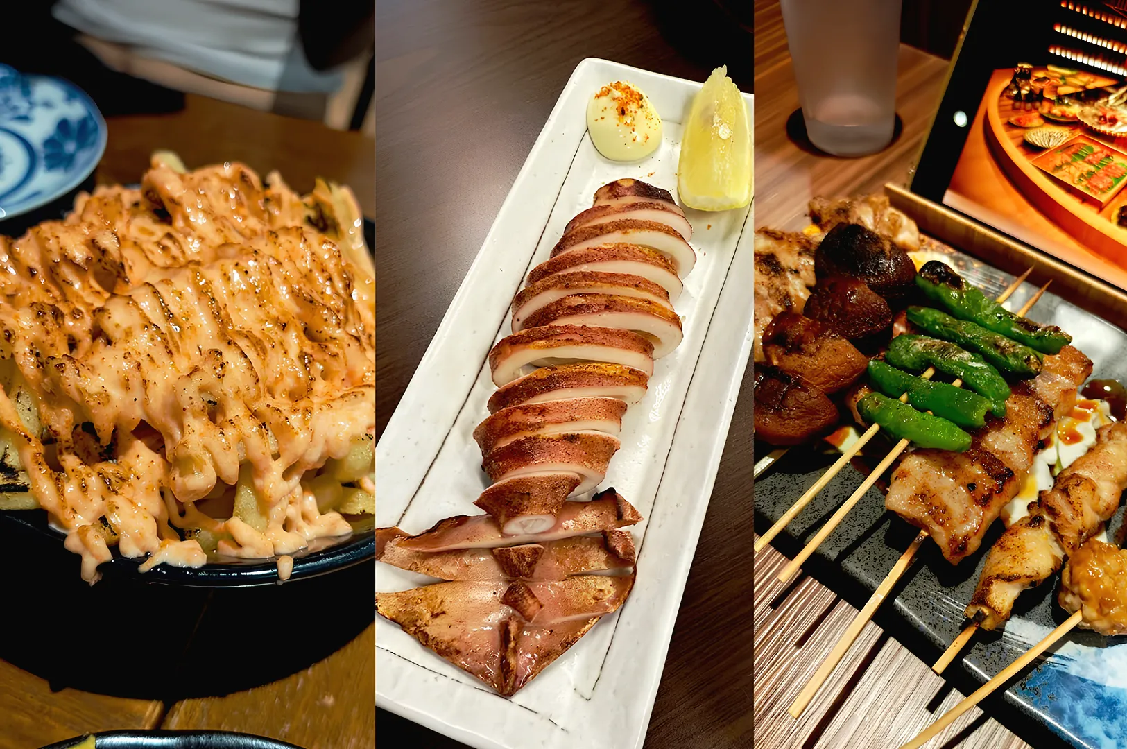 assorted izakaya dishes including yakitori skewers grilled squid and Japanese bar food close up