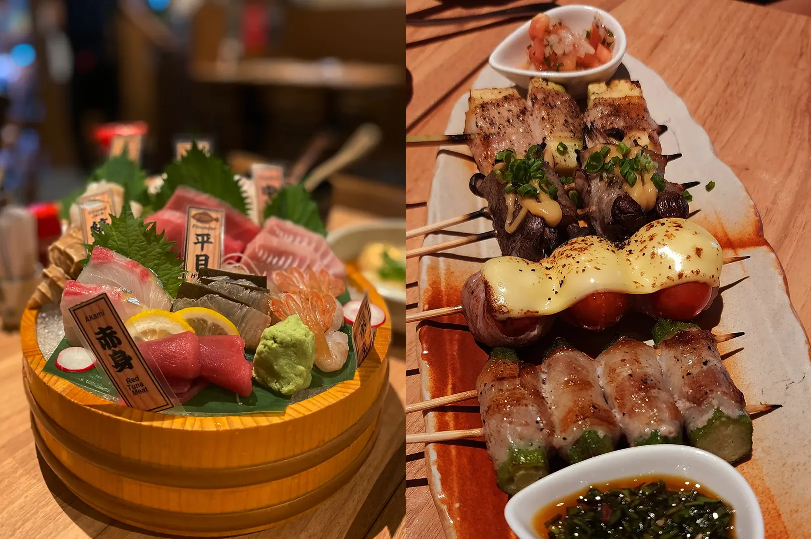 Assorted sushi and yakitori skewers served on a wooden table.