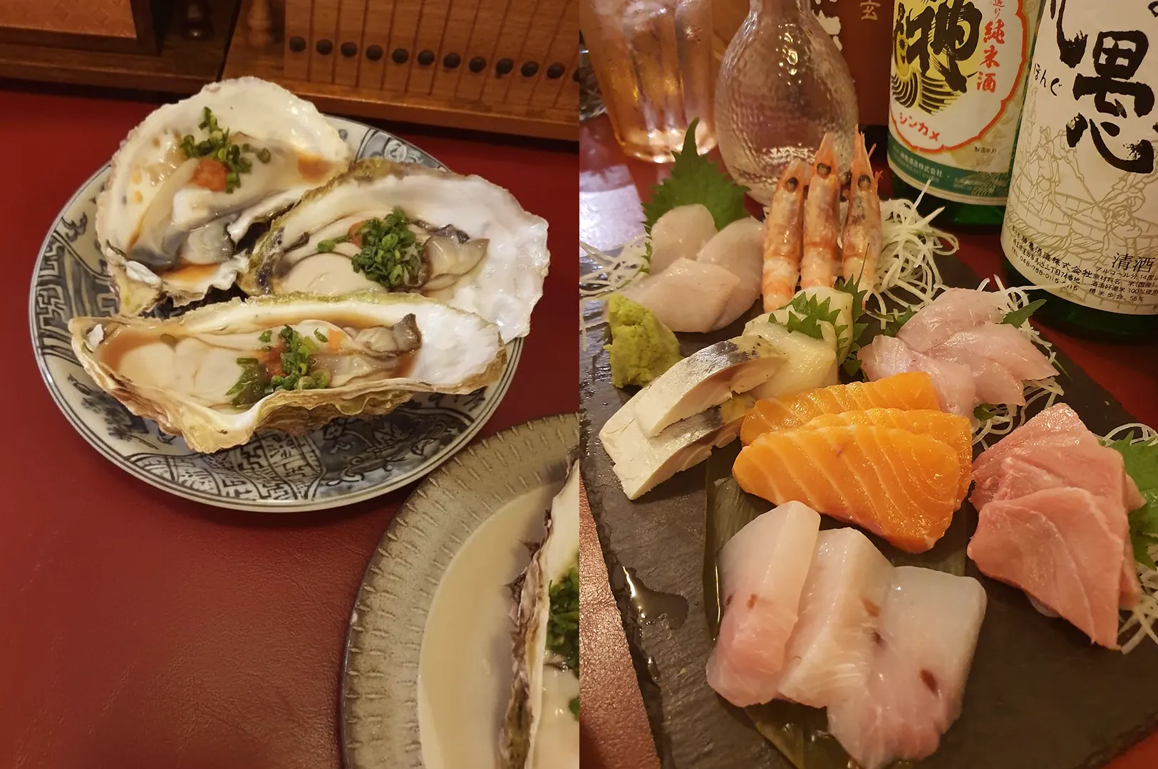 Sashimi platter and grilled oysters with sake bottles.