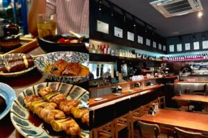 yakitori skewers and Japanese small plates served in modern izakaya bar interior Singapore